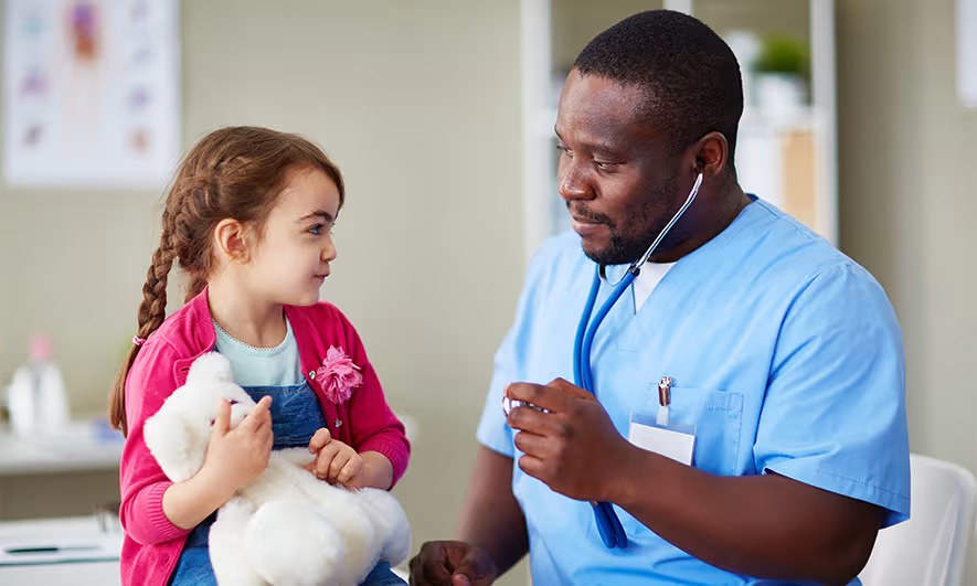 Healthcare provider with young patient